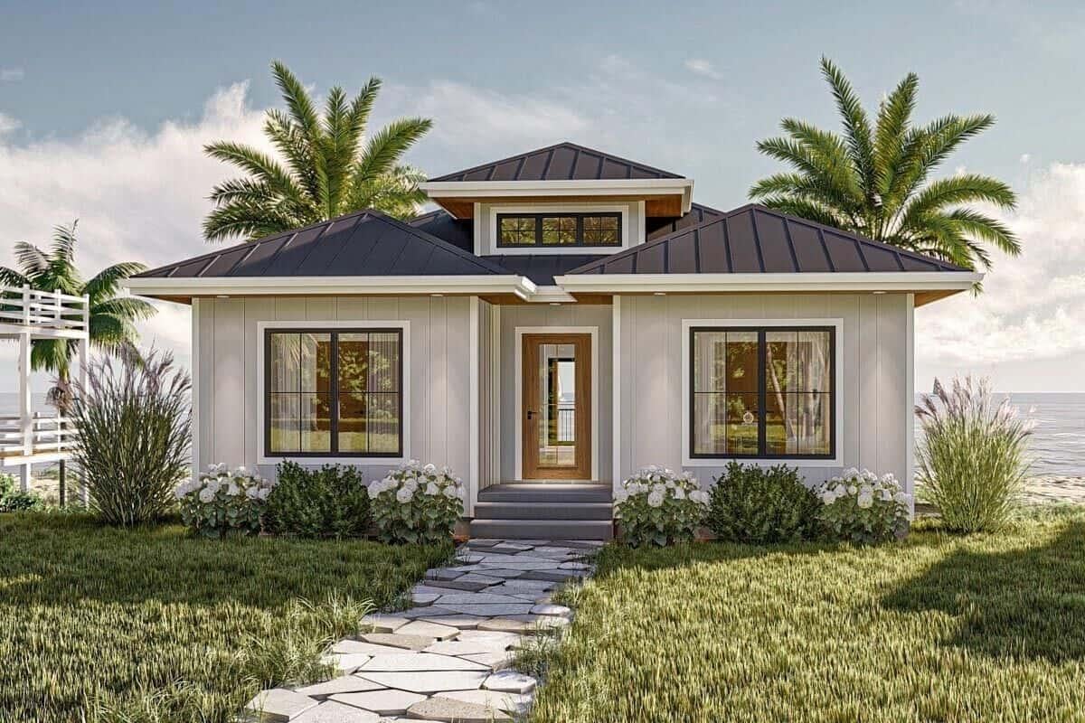 Coastal Bungalow with Charming Metal Roof and Palm Accents