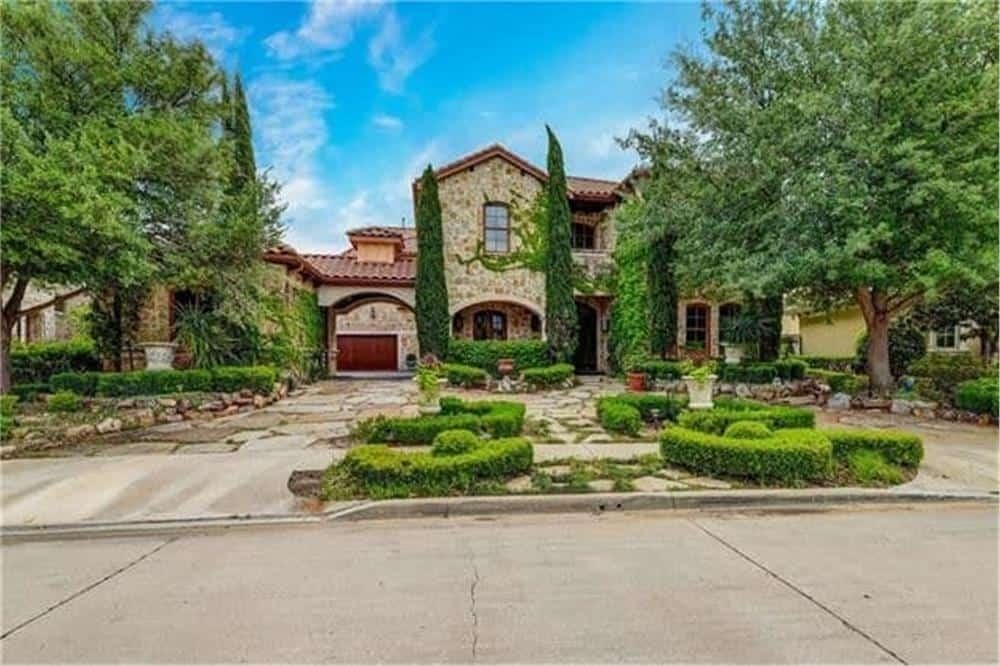 Rustic Stone Facade with Verdant Landscaping