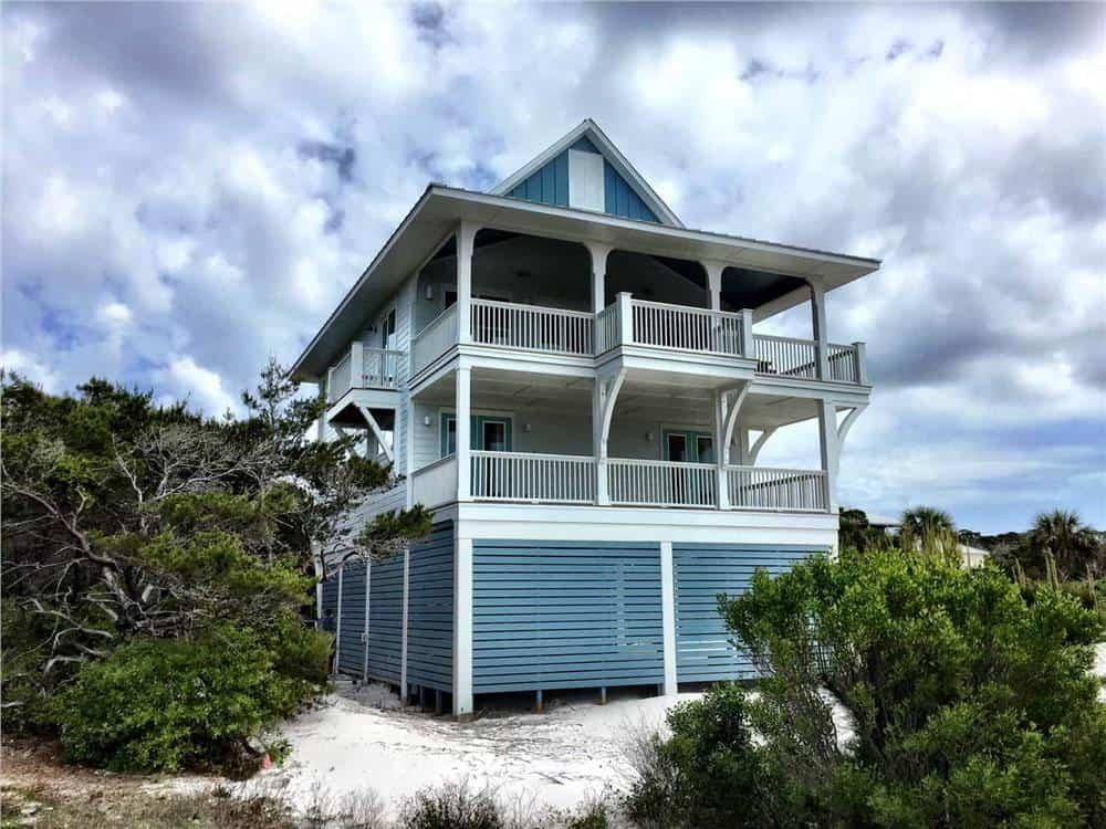 Coastal Charm with Expansive Wraparound Balconies