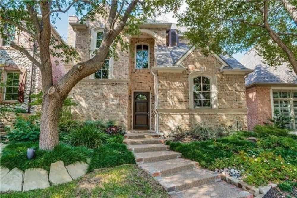 Charming Brick Facade with Arched Entryway