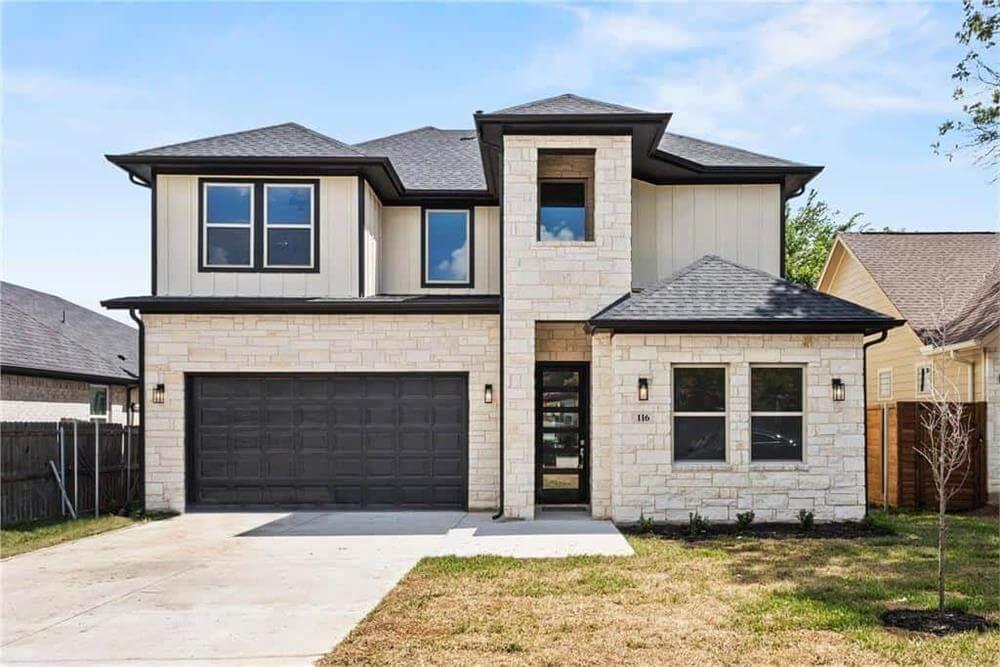 Contemporary Two-Story Home with Stone Facade and Dark Accents