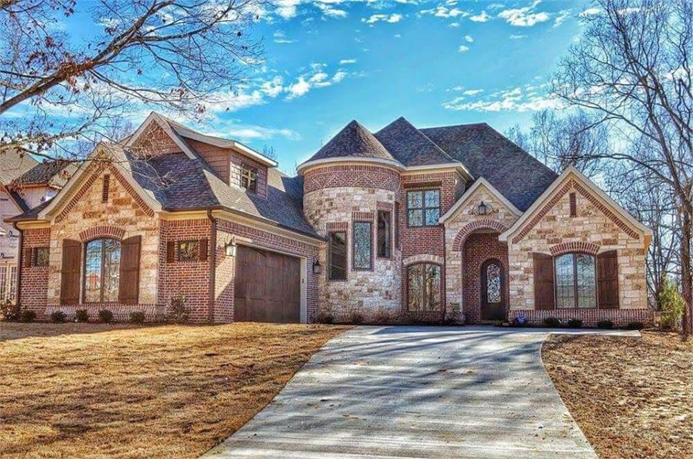 Discover the Unique Turret in This Elegant Brick Home