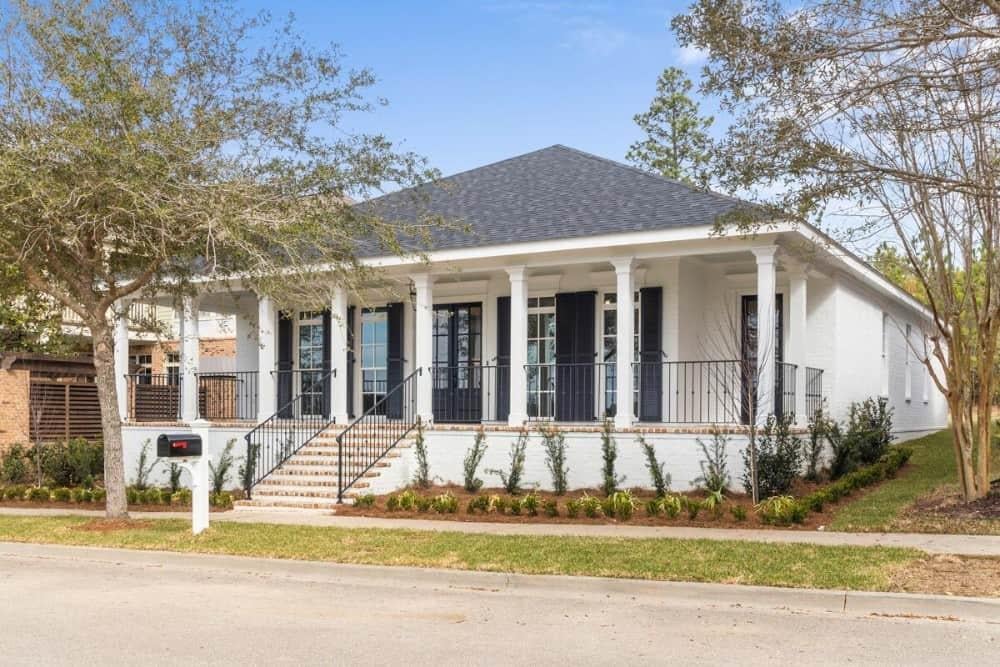 Classic Southern Charm with Elevated Front Porch and Shuttered Windows