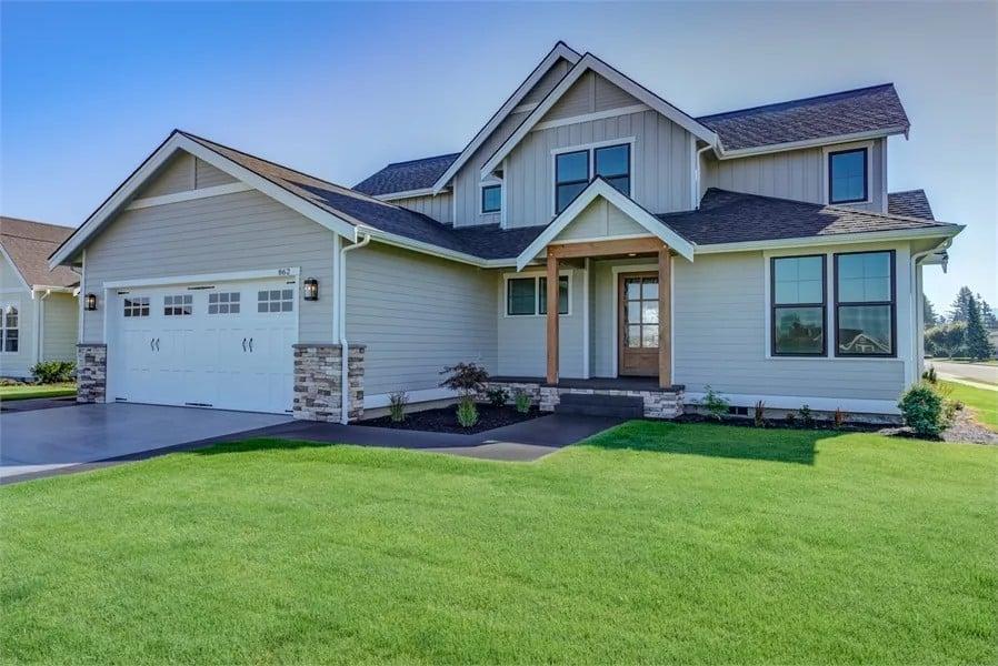 Modern Farmhouse with a Charming Front Porch and Gable Roof
