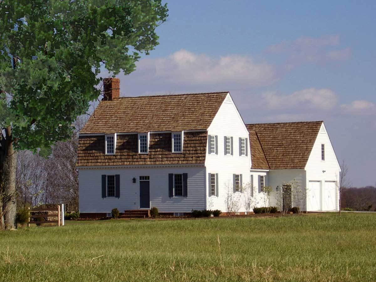 Classic Colonial Home with Charming Dormers and Double Garage