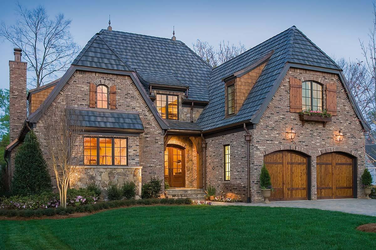Charming Tudor Revival with Distinctive Brickwork and Wooden Accents
