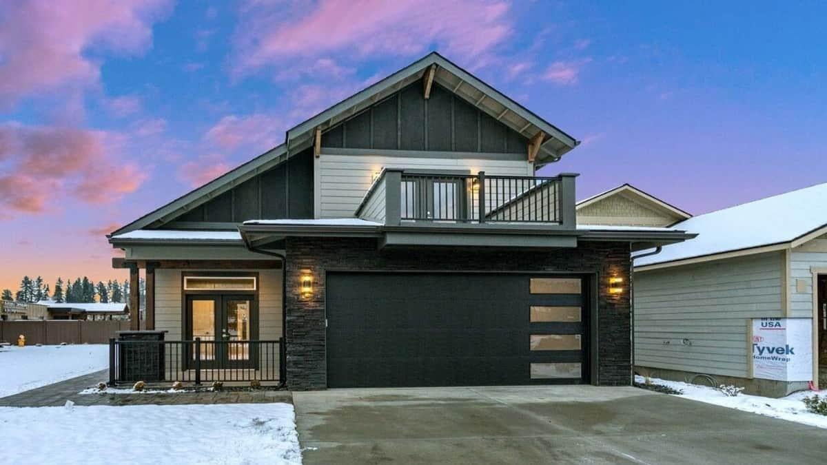 Check Out the Bold Black Garage Door on This Contemporary Home