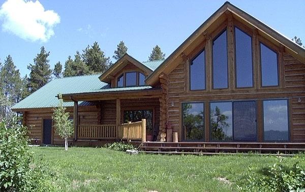 Rustic Log Cabin with Soaring A-Frame Windows