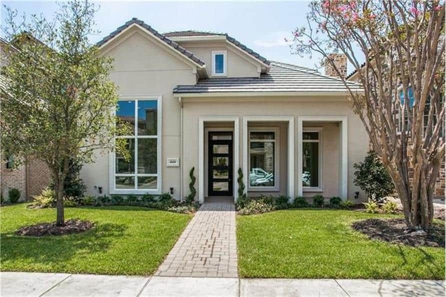 Check Out the Sleek Entryway with Symmetrical Windows