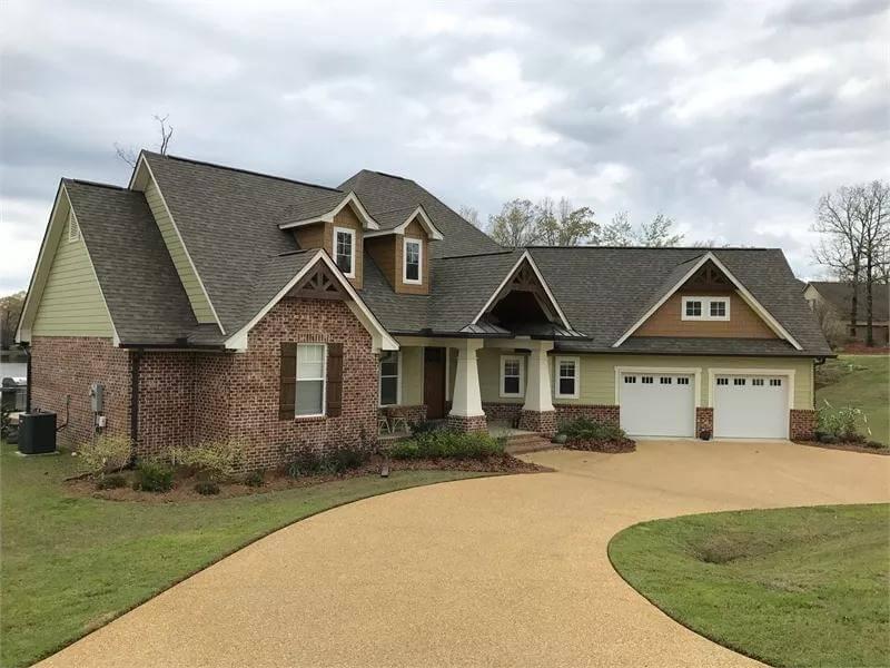 Charming Brick Facade with Dormer Windows Adds Character