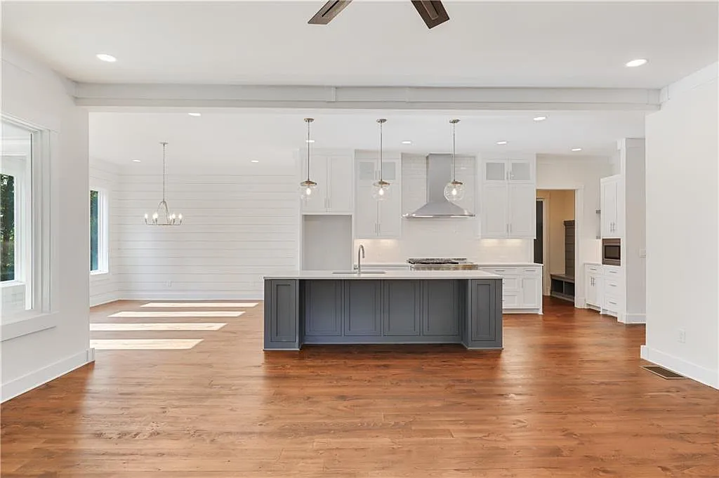 Farmhouse 5-Bedroom Home with Covered Front Porch and 3-Car Garage (4,517 Sq. Ft. Floor Plan)