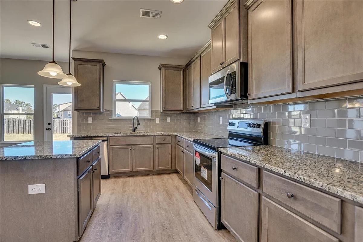 4-Bedroom Traditional Home with Front Porch and 2-Car Garage (2,972 Sq. Ft. Floor Plan)