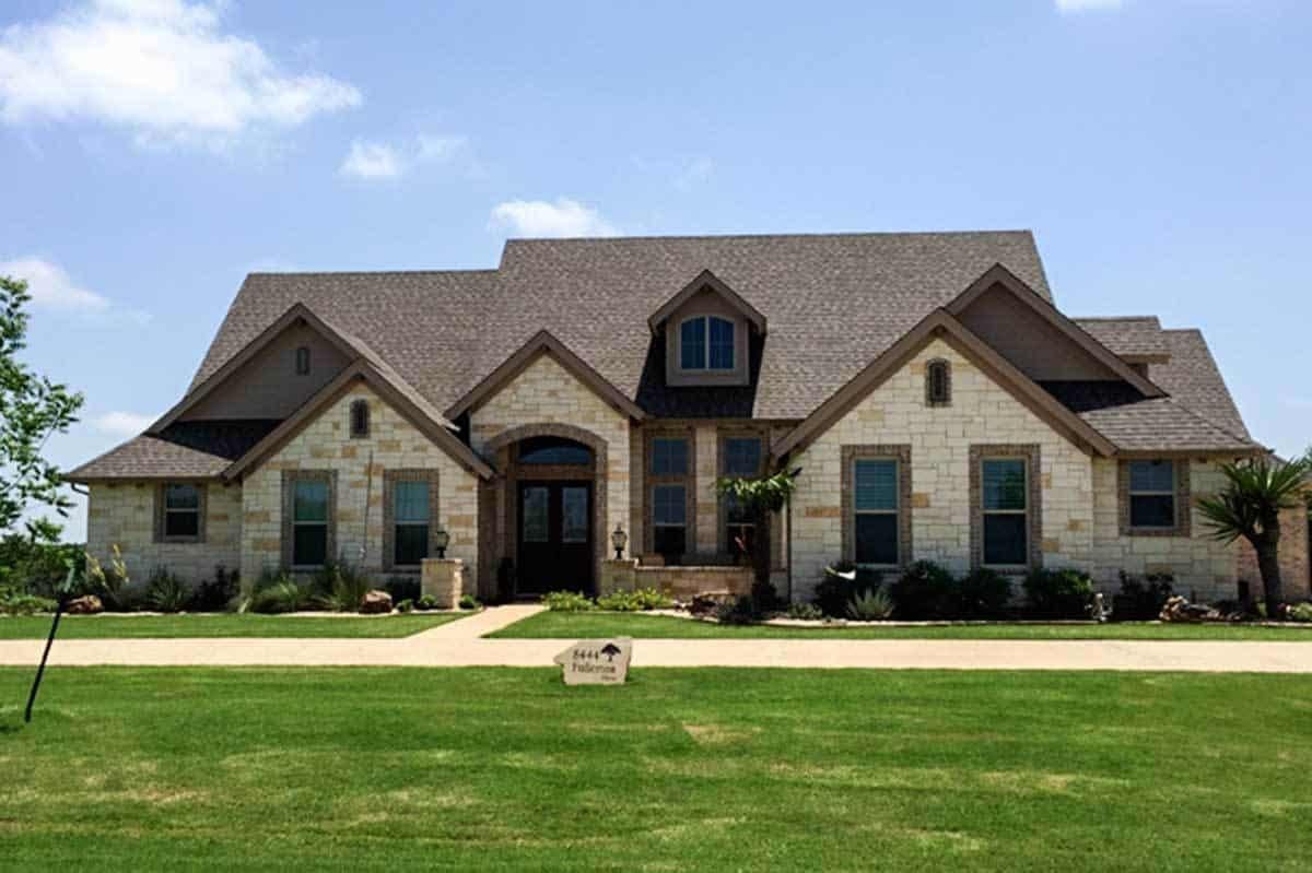 Classic Ranch Exterior with Stone Facade and Gabled Roof