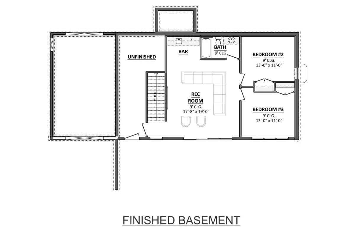 Explore the Versatile Finished Basement with Bar and Rec Room