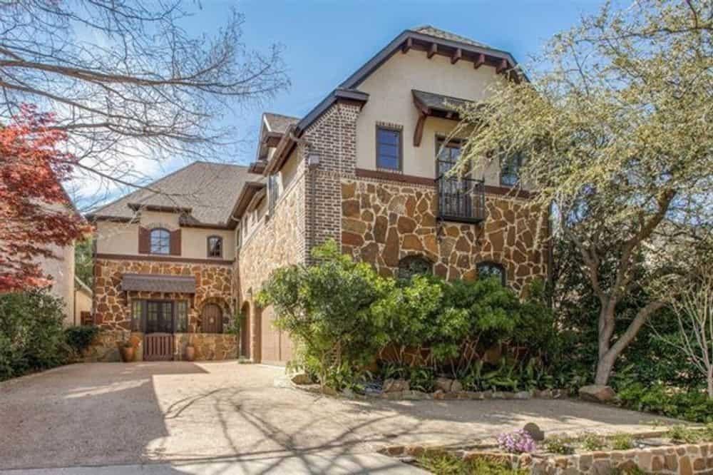 Explore the Rustic Charm of This Stone-Clad 3-Bedroom Home