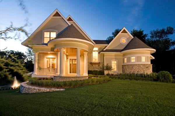 Stately Home with Striking Circular Porch and Turret Detail