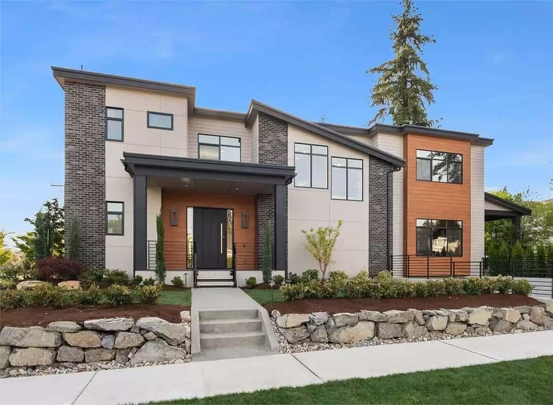 Sleek Modern Facade with Contrasting Brick and Wood Panels