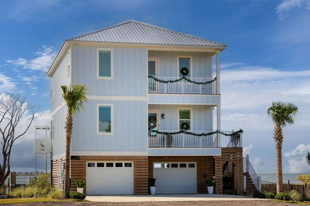 Coastal Home with Multiple Balconies and Metal Roof