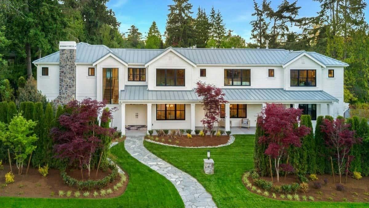 Stately Residence with a Classic Stone Chimney and Metal Roof