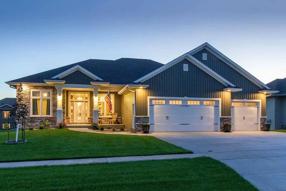 Admire the Inviting Front Porch and Triple Garage Setup