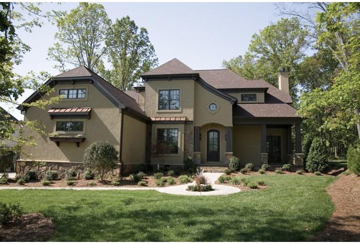 Stately Two-Story Home with Elegant Arched Entrance