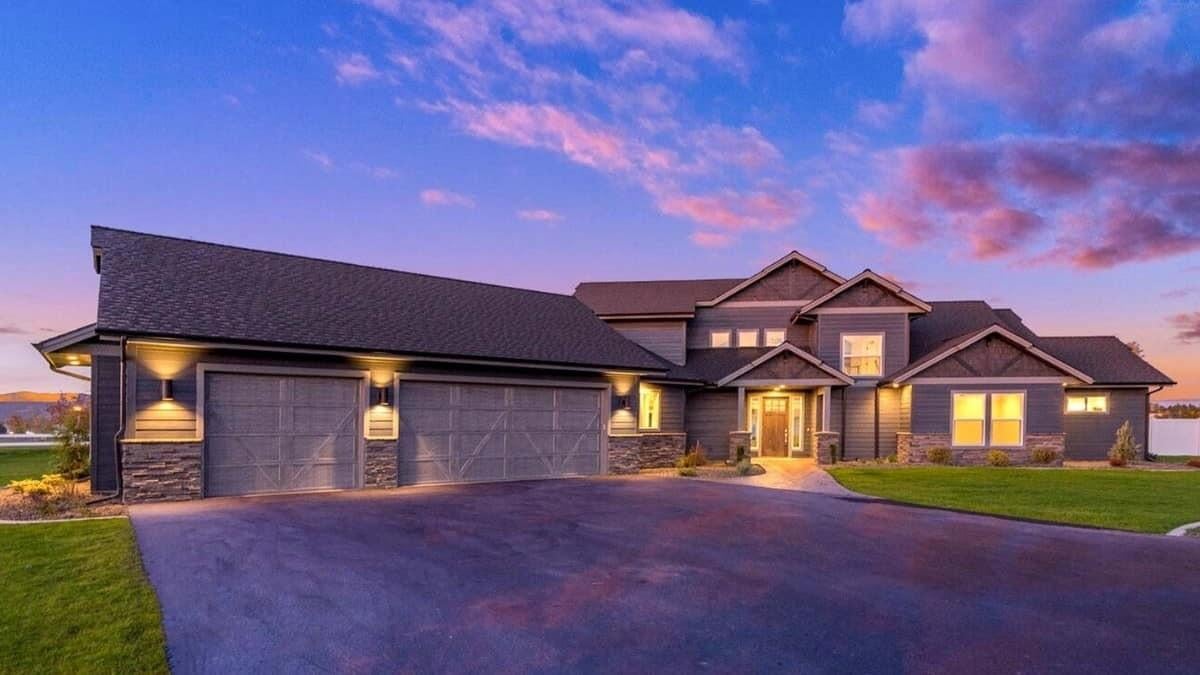 Twilight Elegance: Discover the Stone Accents on This Modern Facade