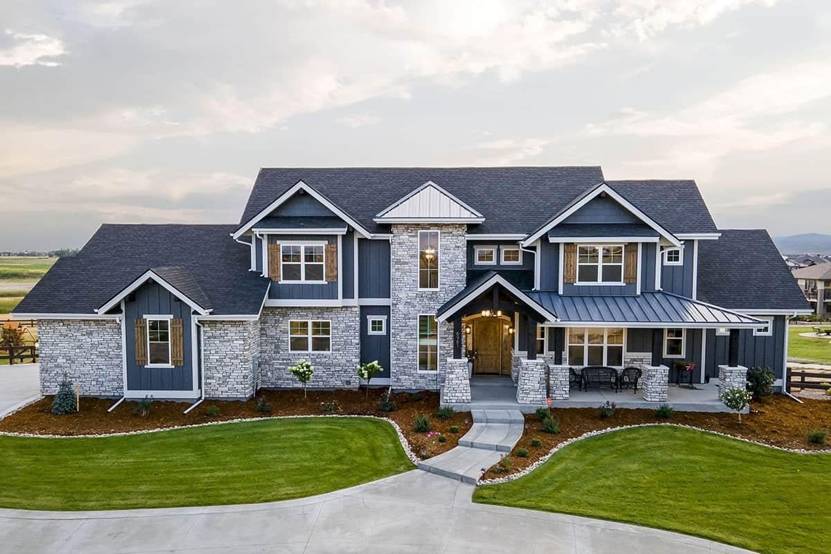 Charming Farmhouse with Stone Facade and Broad Gables