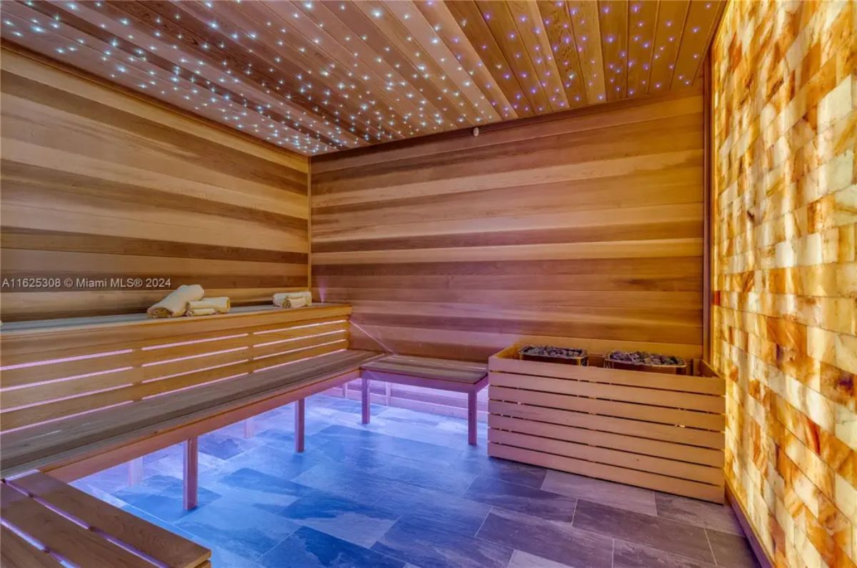 Cedar wood interior with built-in benches creates a warm and inviting atmosphere.