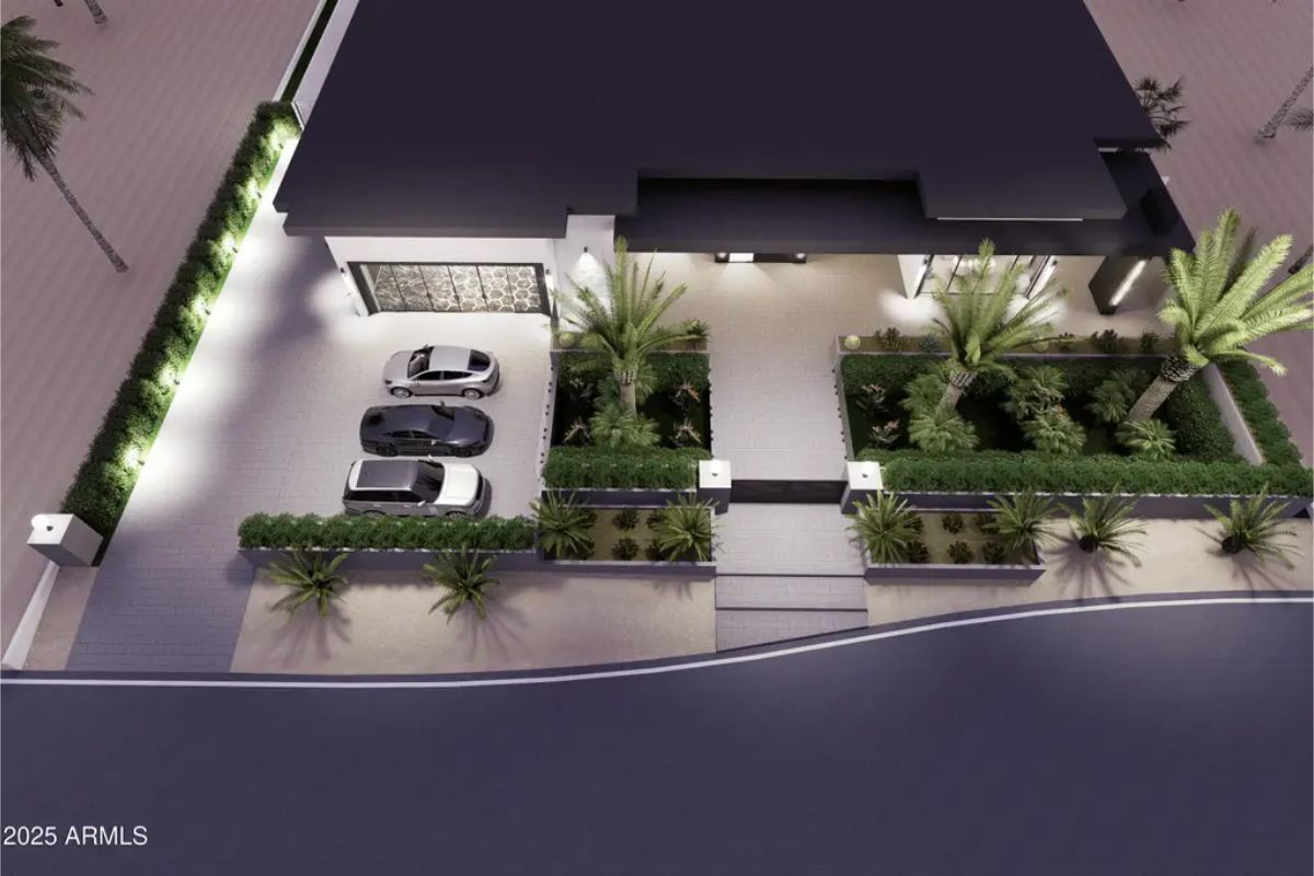 Aerial view showcases a contemporary residence with a sleek black roof and minimalist design.