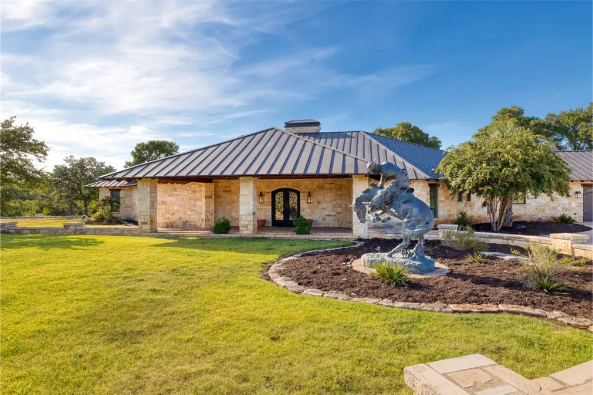 Priced at $2,990,000, this 6,294 sq. ft. waterfront estate, built in 2013, sits on 28 acres in Texas Hill Country, featuring five bedrooms, six baths, and a year-round live creek supported by a concrete dam.