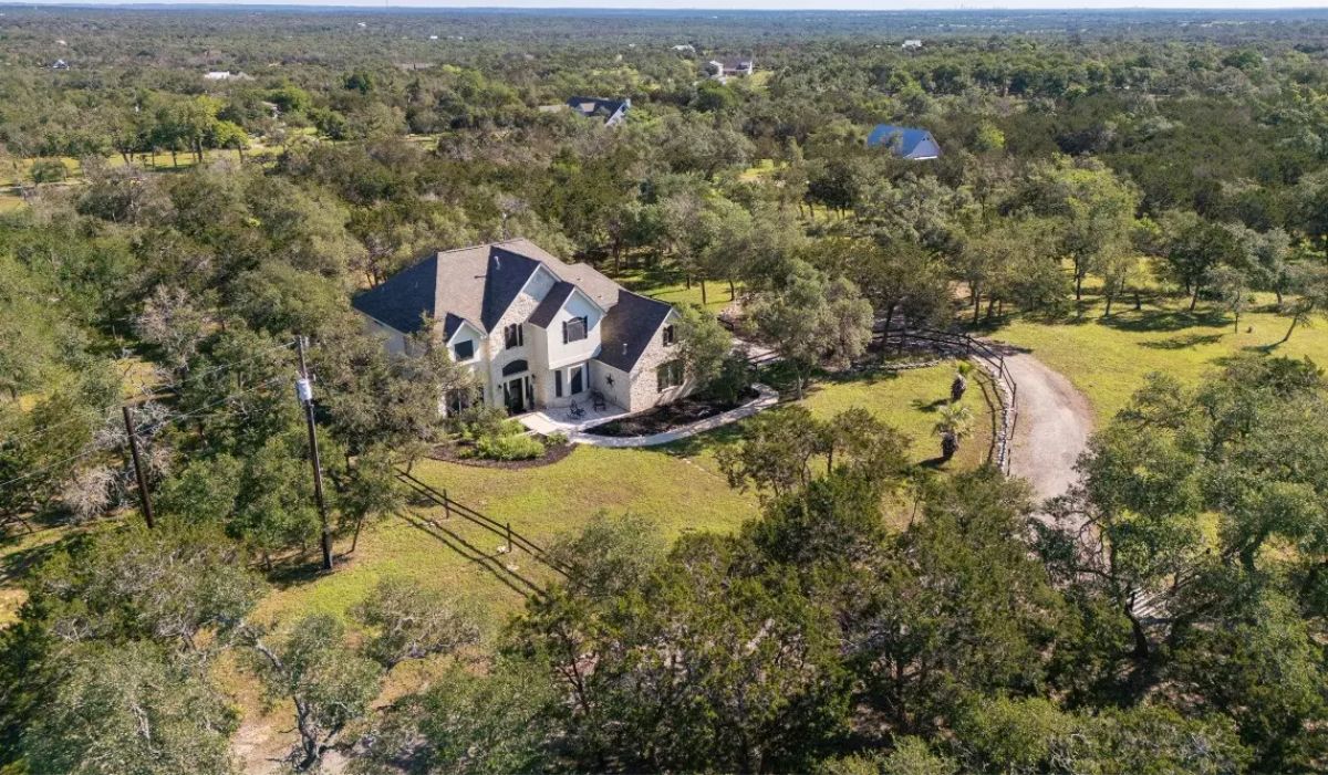 This $1,250,000 property includes a 4,173 sq. ft. main home with 4 bedrooms and 3.5 baths, updated in 2023, along with a 1,368 sq. ft. 2-bedroom, 2-bath guest house.