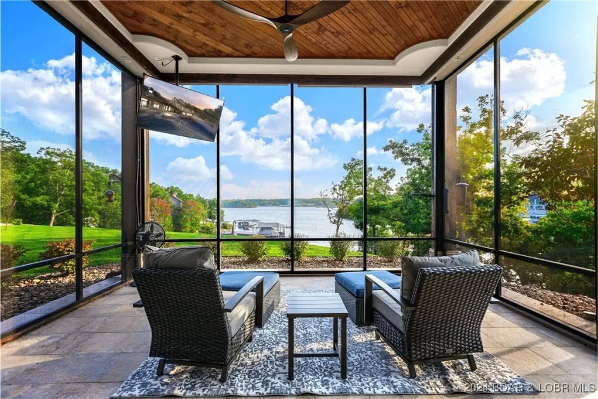 Relaxing seating area enclosed with floor-to-ceiling screens.