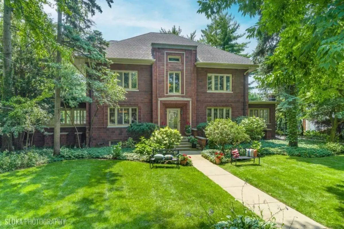 Listed for $2,739,900, this 7-bedroom, 6-bathroom, 6,102 sq ft home, built in 1917, is located in East Winnetka, less than half a block from Lake Michigan.
