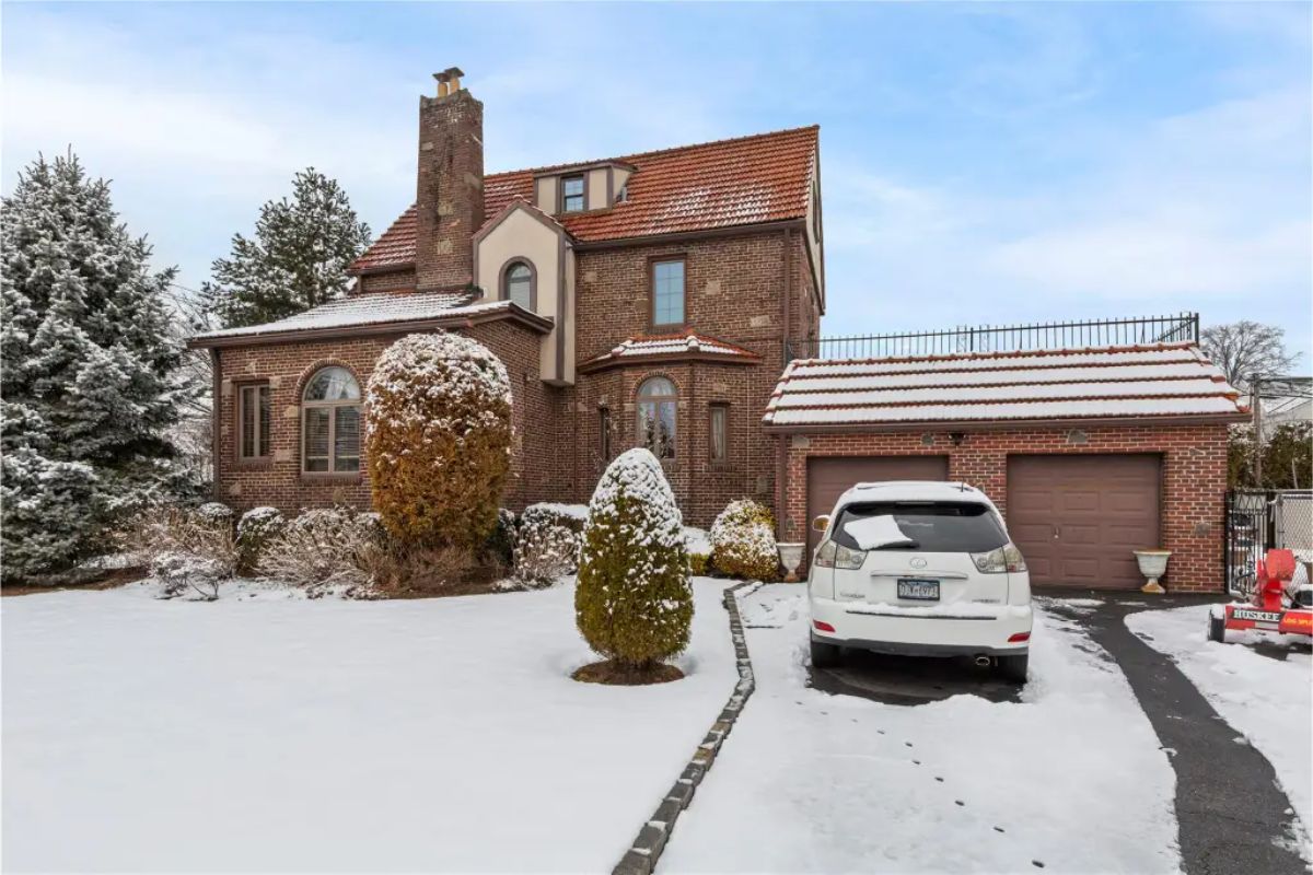 This $2,188,000 Tudor-style home in Malba, Queens, spans 2,660 sq. ft. with 4 bedrooms and 3 bathrooms, offering timeless elegance in a prestigious waterfront enclave.
