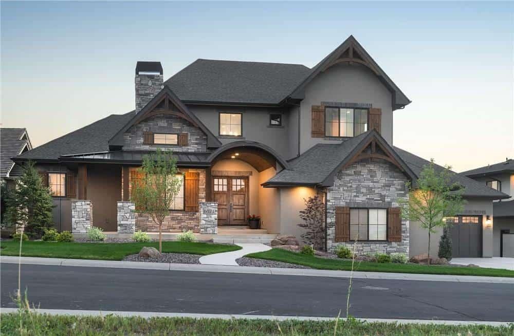 Impressive Facade with Stone Accents and Arched Entryway