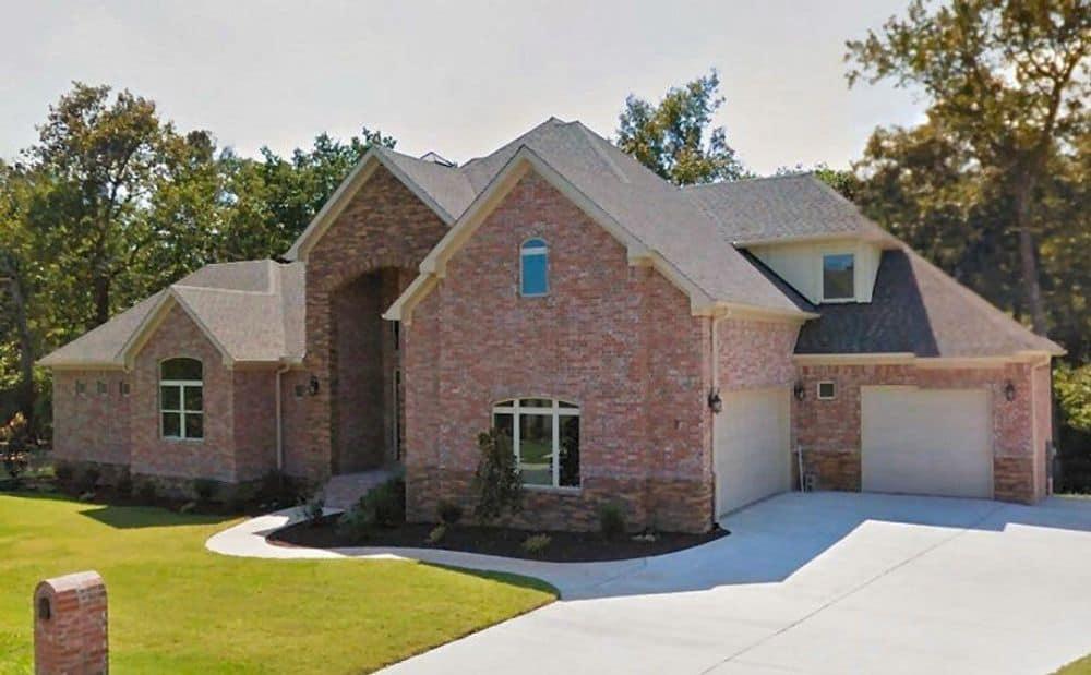 Classic Brick Facade with a Grand Entrance Archway