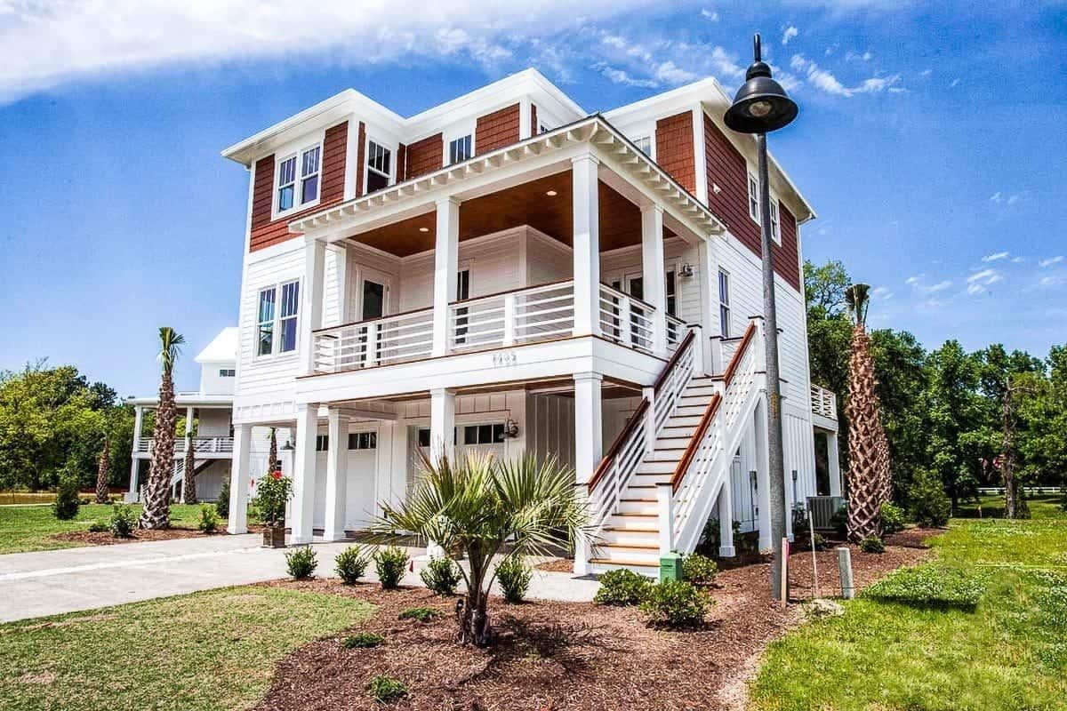 Elevated Beach House with a Charming Wraparound Porch