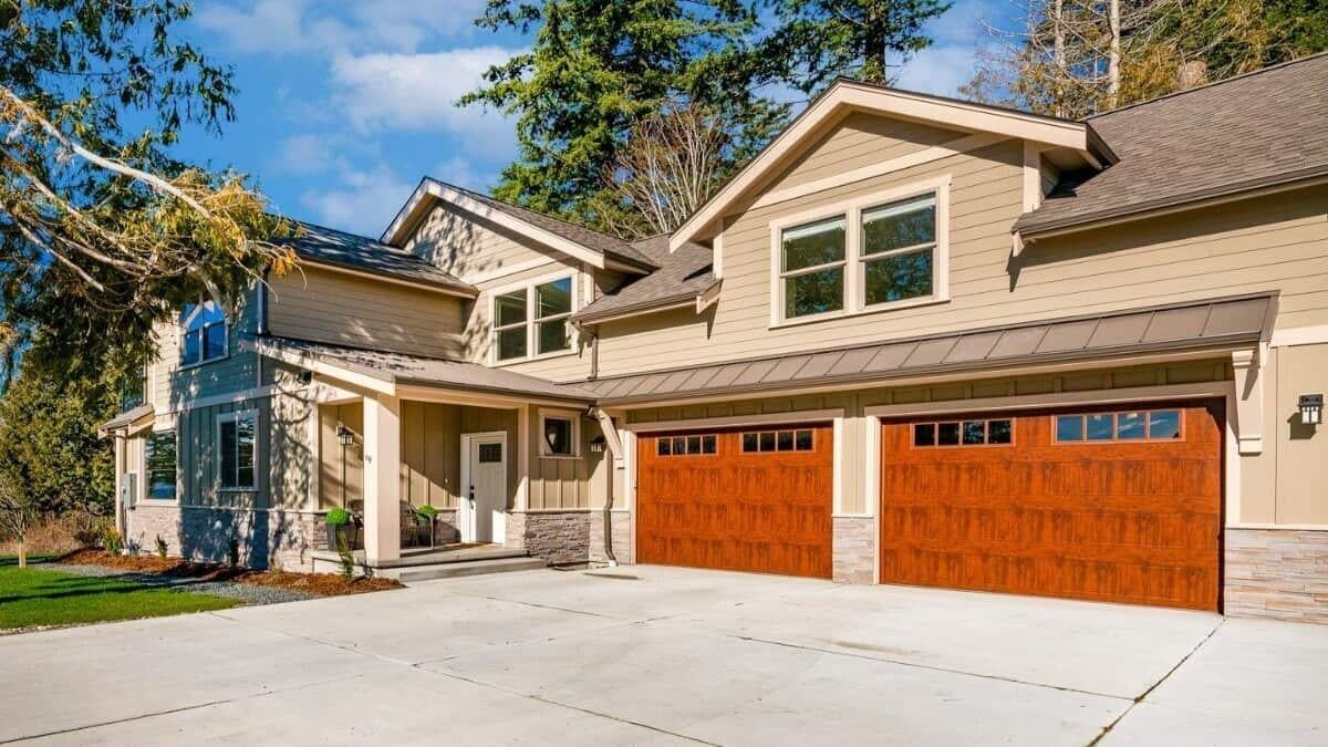 Modern Suburban Home with Striking Wooden Garage Doors