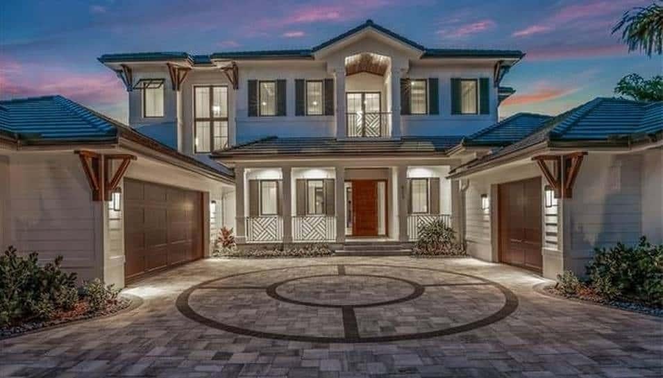 Grand Entrance with Symmetrical Garage Design in Suburban Retreat