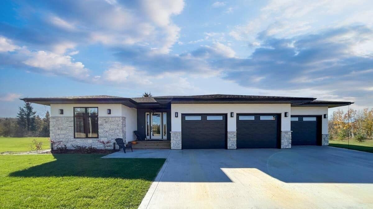 Sleek Modern Bungalow with Triple Garage Doors