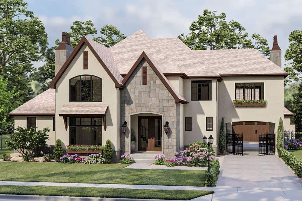Take in the Stone Facade and Elegant Gable Rooflines of This Classic Home