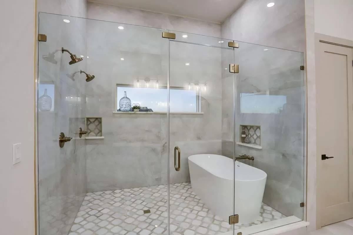 Spacious Wet Room with Freestanding Tub and Dual Showerheads