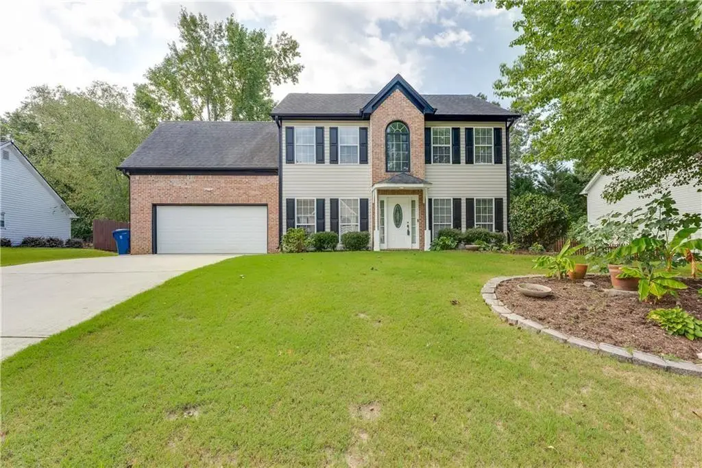Traditional-Style 4-Bedroom Home with Two-Story Foyer and Covered Back Patio (3,310 S. Ft. Floor Plan)