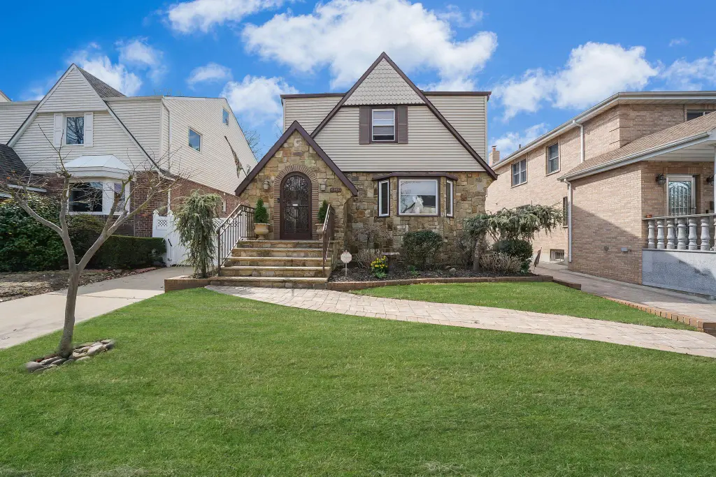 Colonial 3-Bedroom Home with Finished Basement and Detached Garage (1,920 Sq. Ft. Floor Plan)