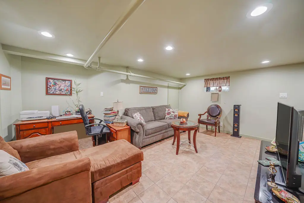 Colonial 3-Bedroom Home with Finished Basement and Detached Garage (1,920 Sq. Ft. Floor Plan)