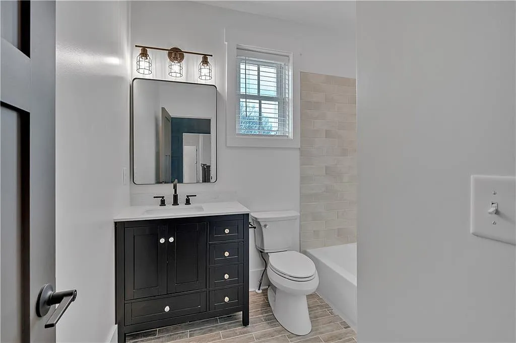 Farmhouse-Style 4-Bedroom Home with Bonus Room and Wraparound Porch (3,407 Sq. Ft. Floor Plan)