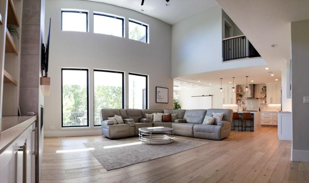 Wow, Those High Ceilings and Expansive Windows Steal the Show in This Great Room