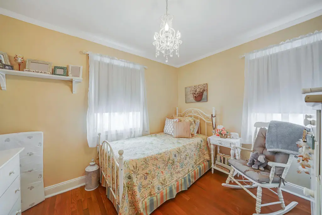 Colonial 3-Bedroom Home with Finished Basement and Detached Garage (1,920 Sq. Ft. Floor Plan)