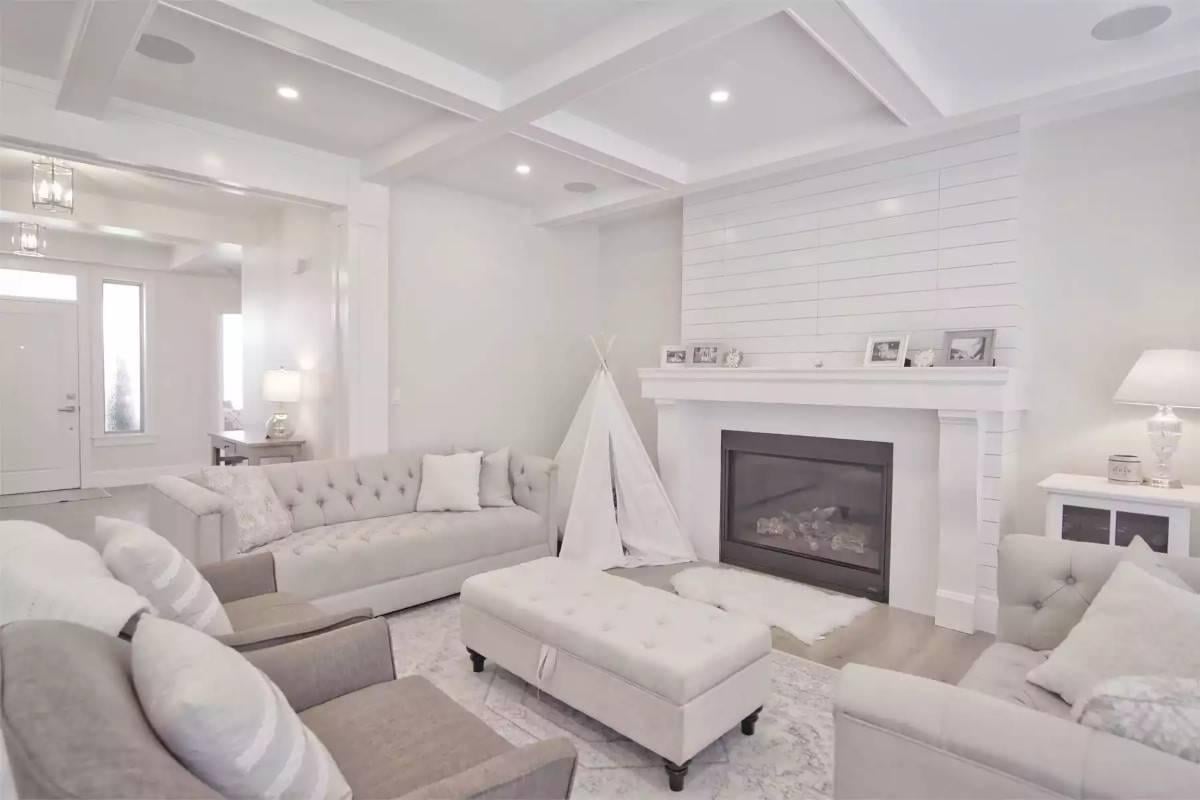 Cozy Living Room with Shiplap Fireplace and Playful Teepee