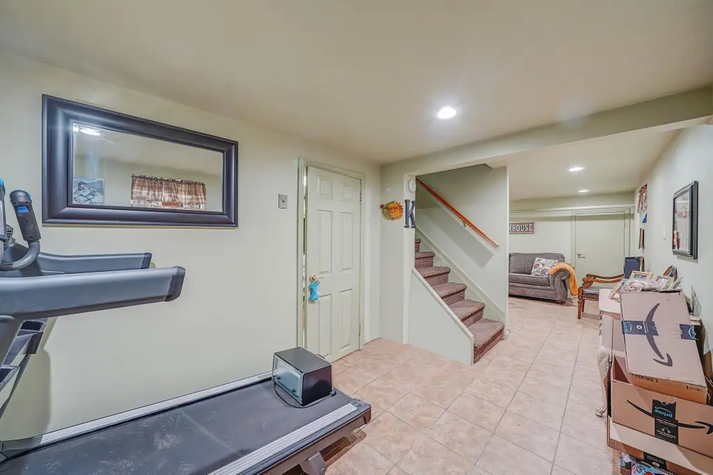 Colonial 3-Bedroom Home with Finished Basement and Detached Garage (1,920 Sq. Ft. Floor Plan)